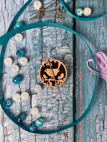 a clock that is sitting on a piece of wood