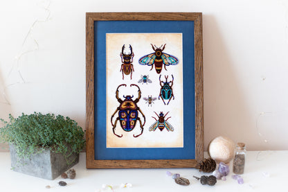 a framed illustration of various insects, including a large beetle, a bee, and several other insects, displayed on a blue background. The insects are depicted in a detailed and colorful manner, showcasing the diversity of insect species. The illustration is surrounded by various objects, such as a potted plant, a crystal ball, and some rocks, creating a visually appealing and harmonious composition.