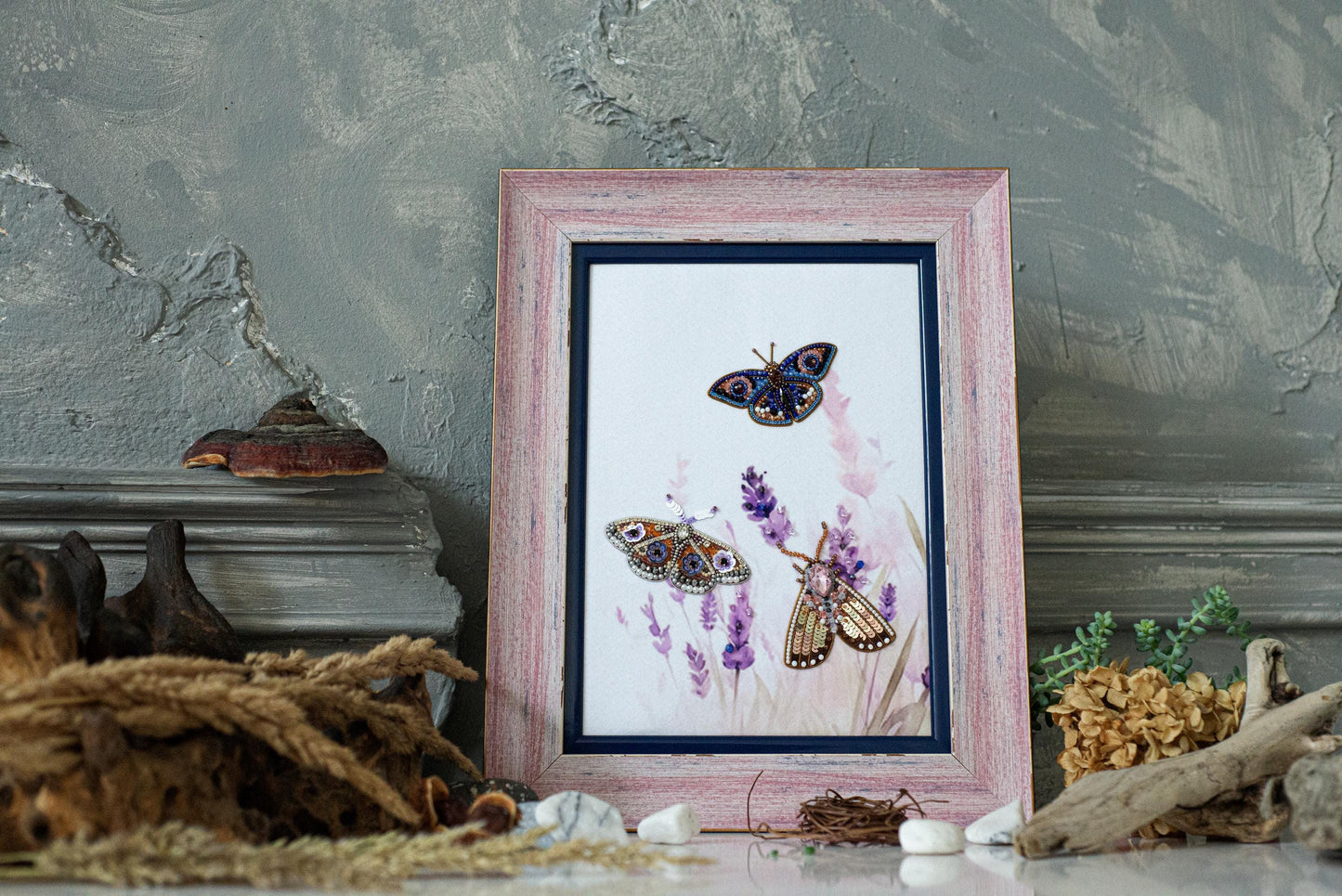 a picture of two butterflies in a frame