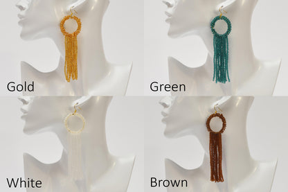 The image is a collage of four images showing different styles of earrings with tassels, each in a different color: gold, green, white, and brown.