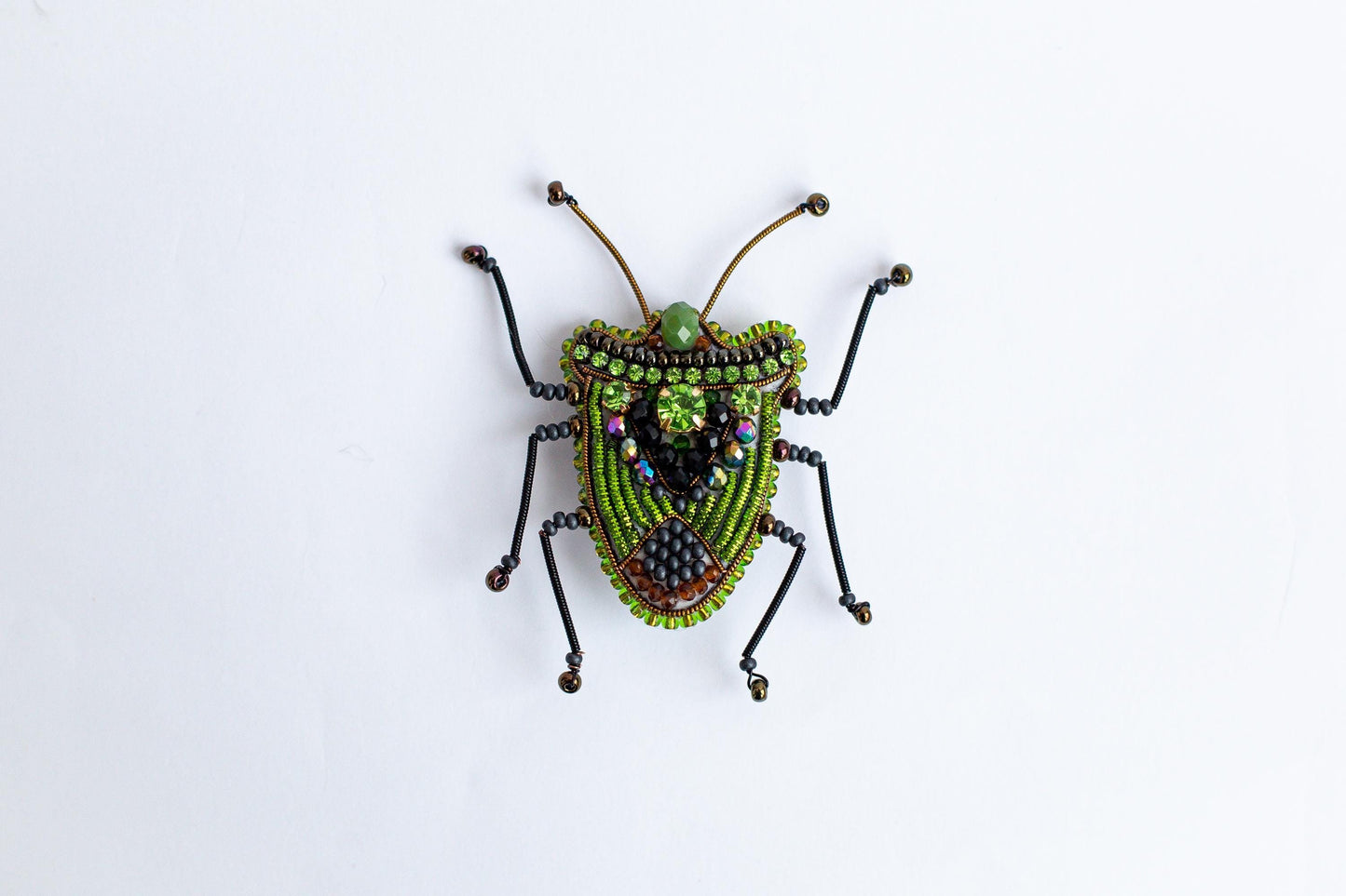 a bug made out of beads and beads