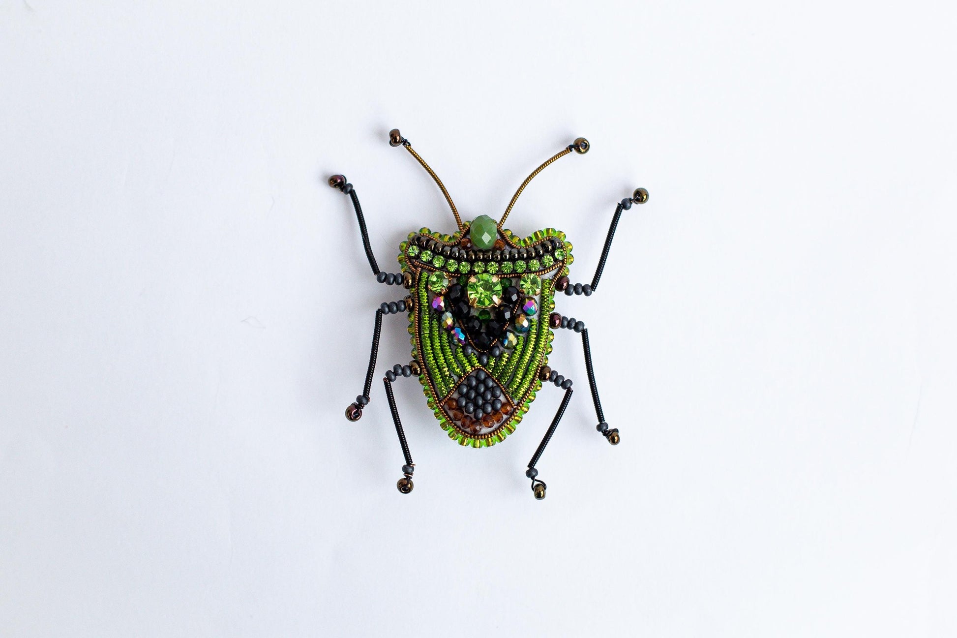 a bug made out of beads and beads