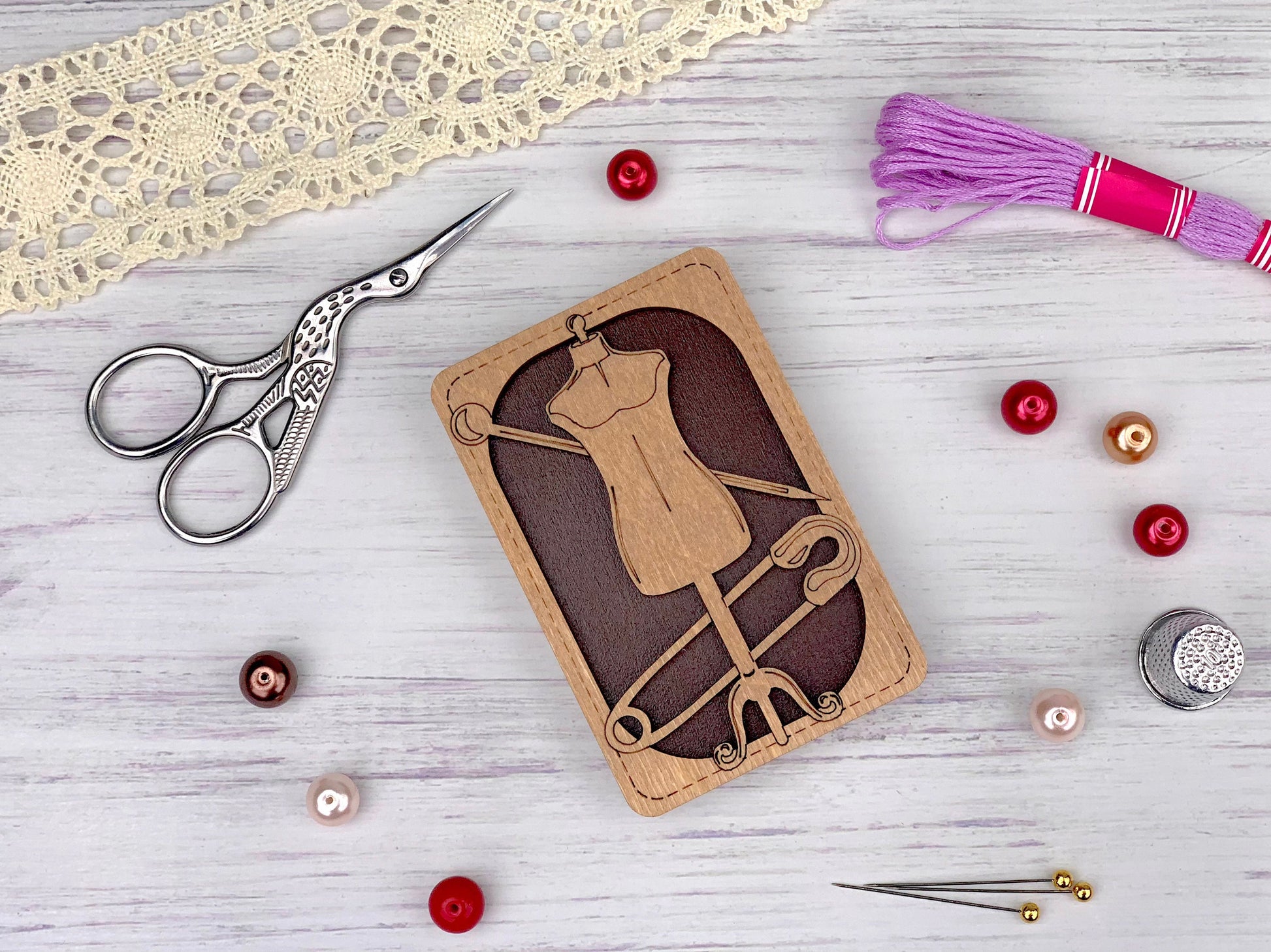 a picture of a dressmaker&#39;s dress and a pair of scissors