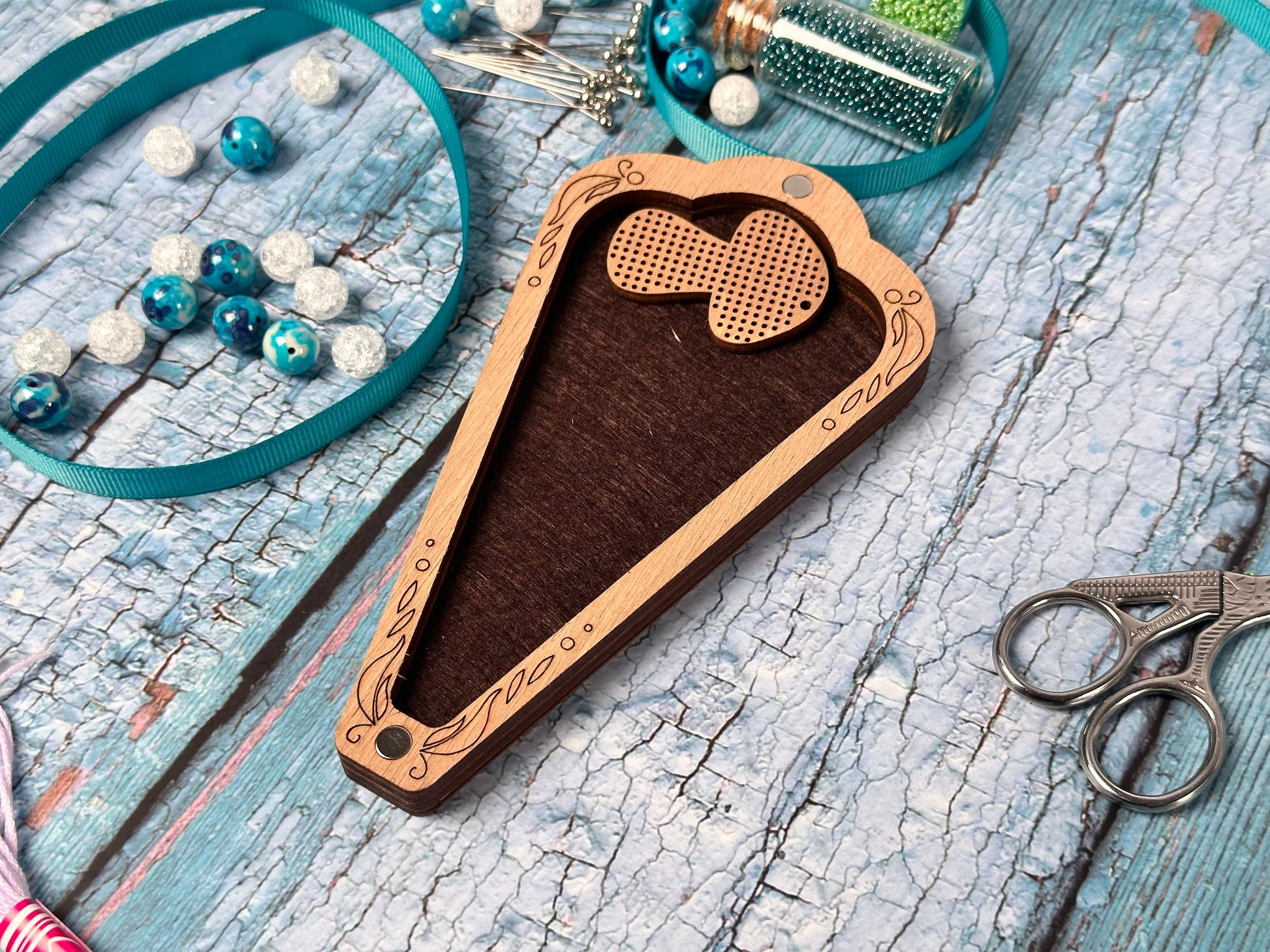 a picture of a wooden case with a heart cut out of it