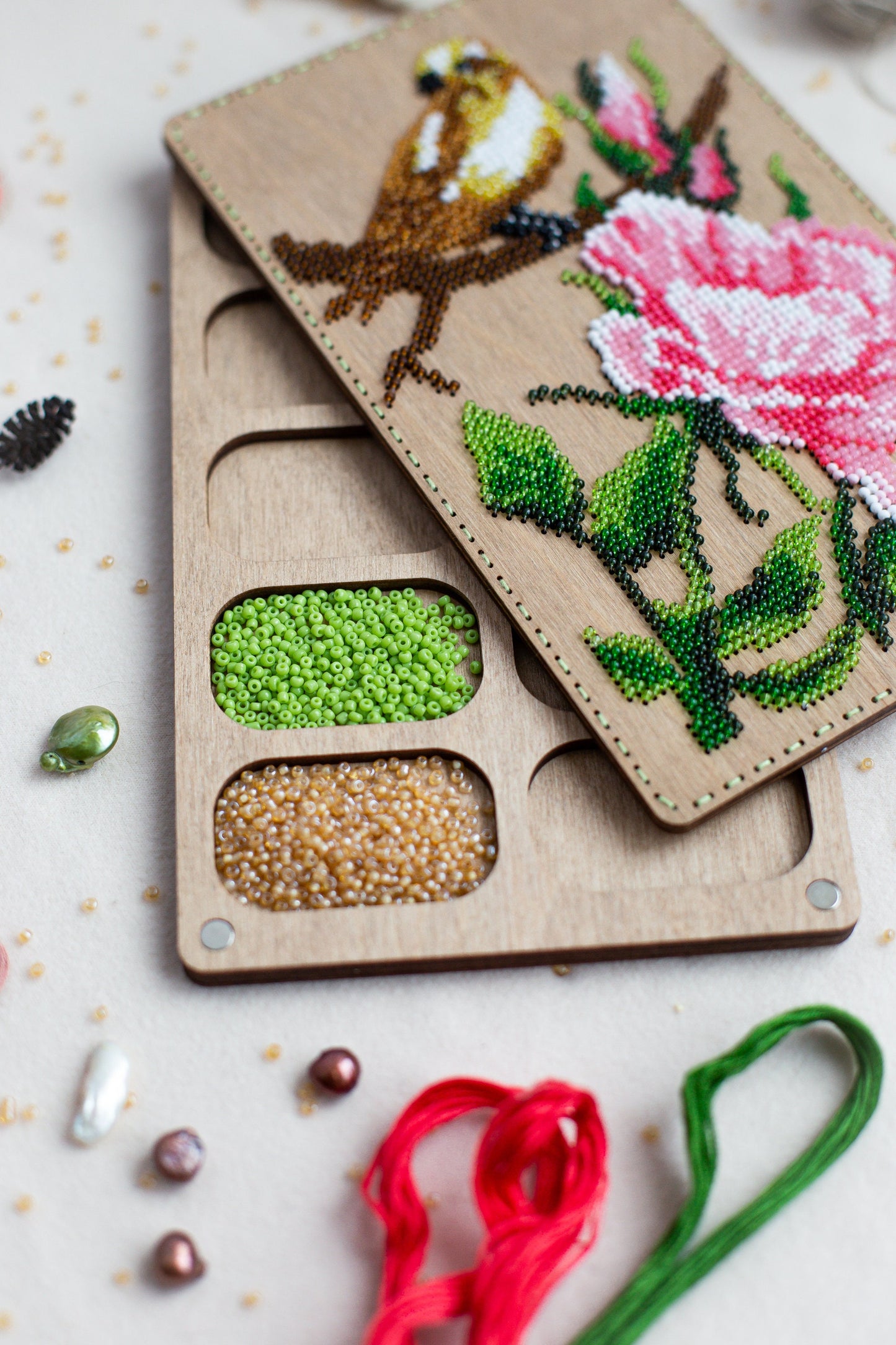 a pair of scissors next to a piece of crafting material