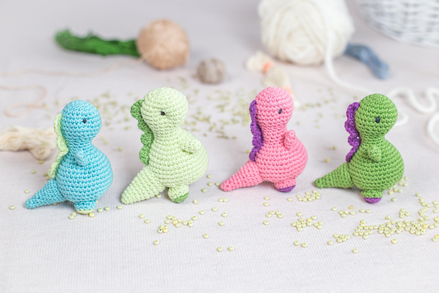 a group of crocheted toys sitting on top of a table