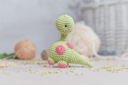 a crocheted toy sitting on top of a table