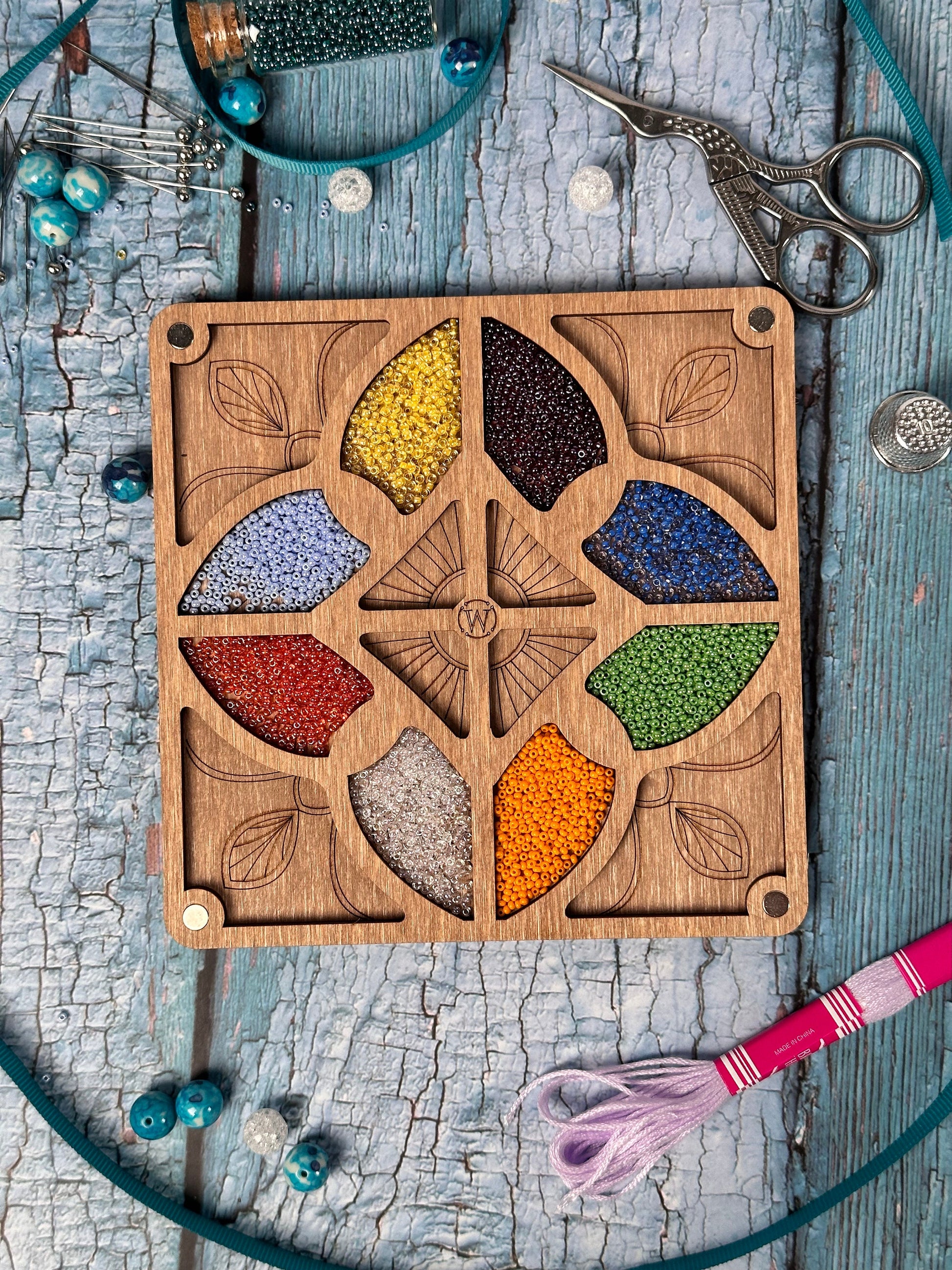 a wooden box with a cut out of a flower