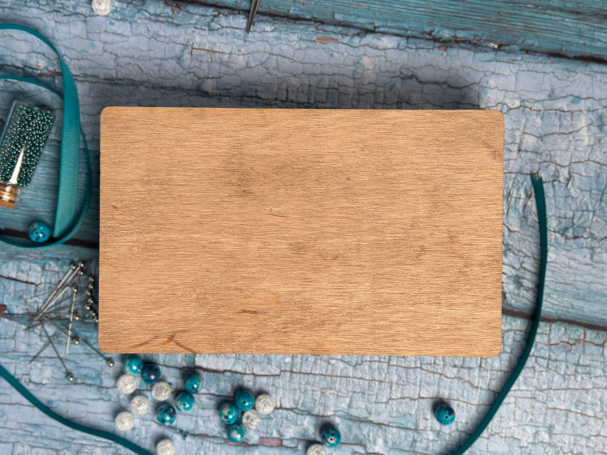 a wooden cutting board sitting on top of a table