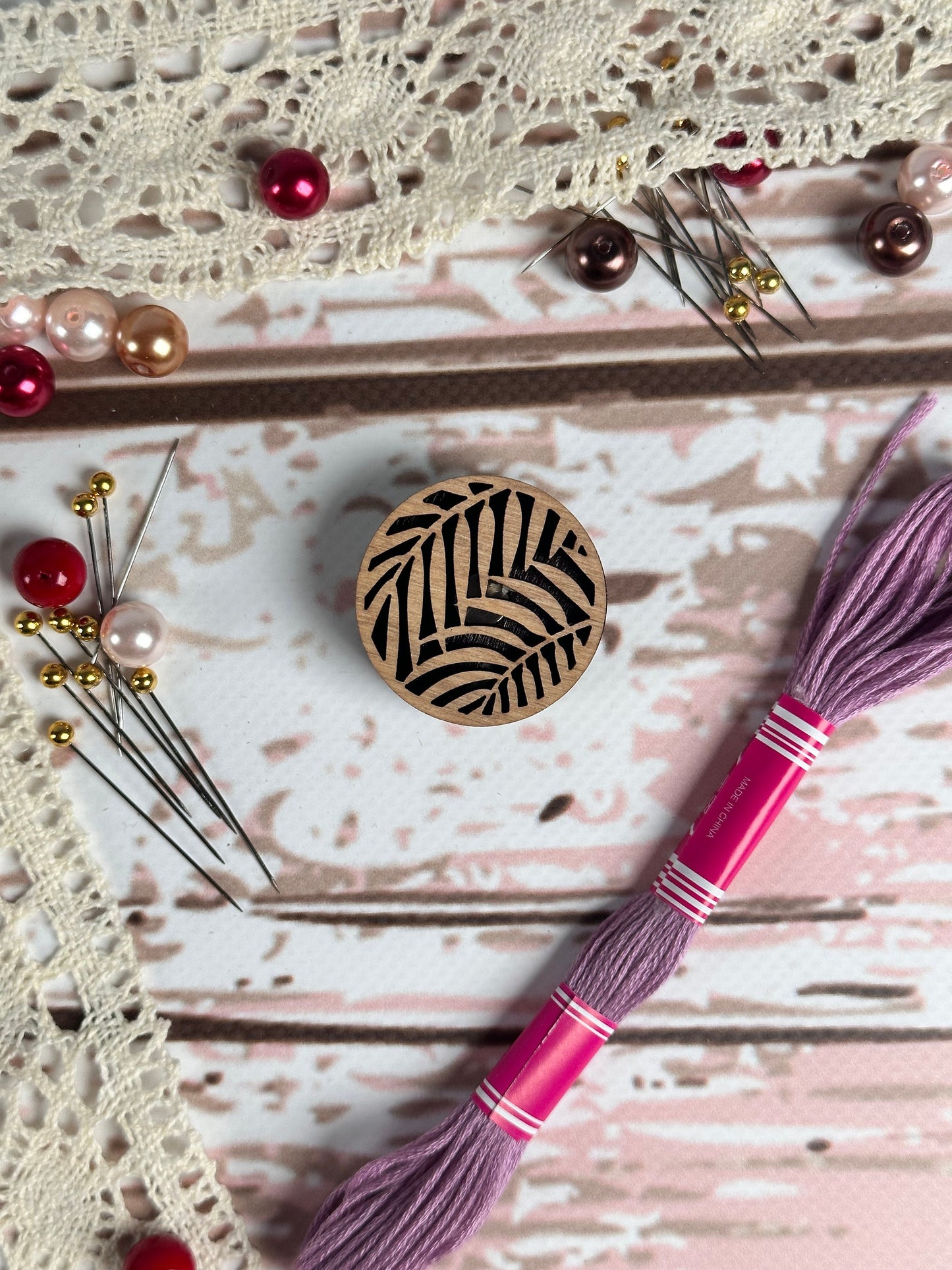 a close up of a button on a table
