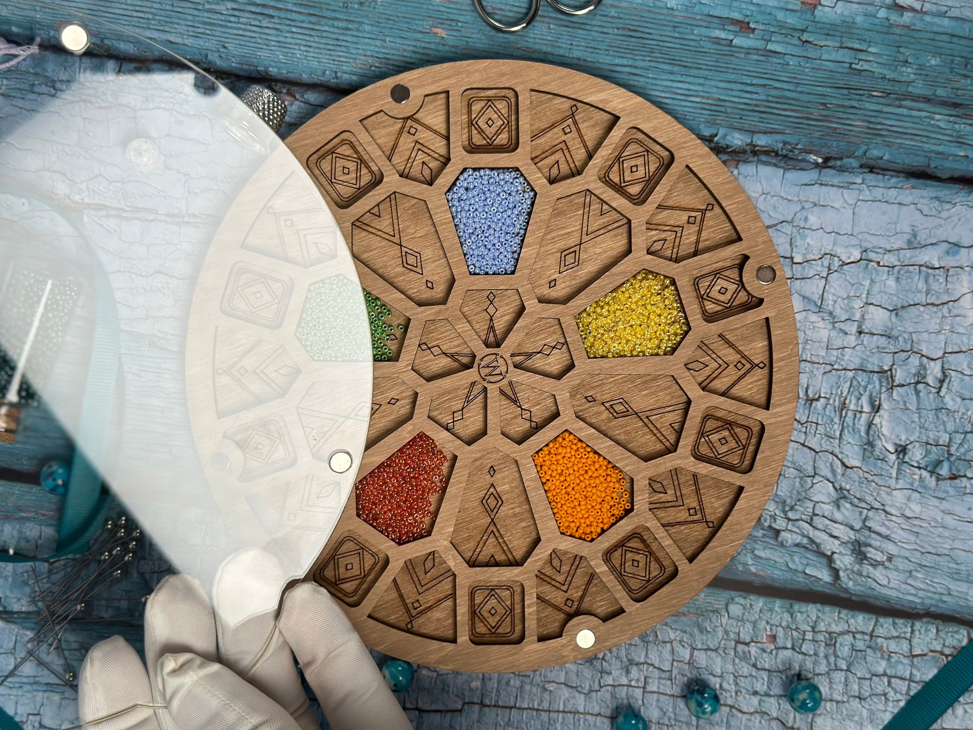 a person holding a wooden board with a pattern on it