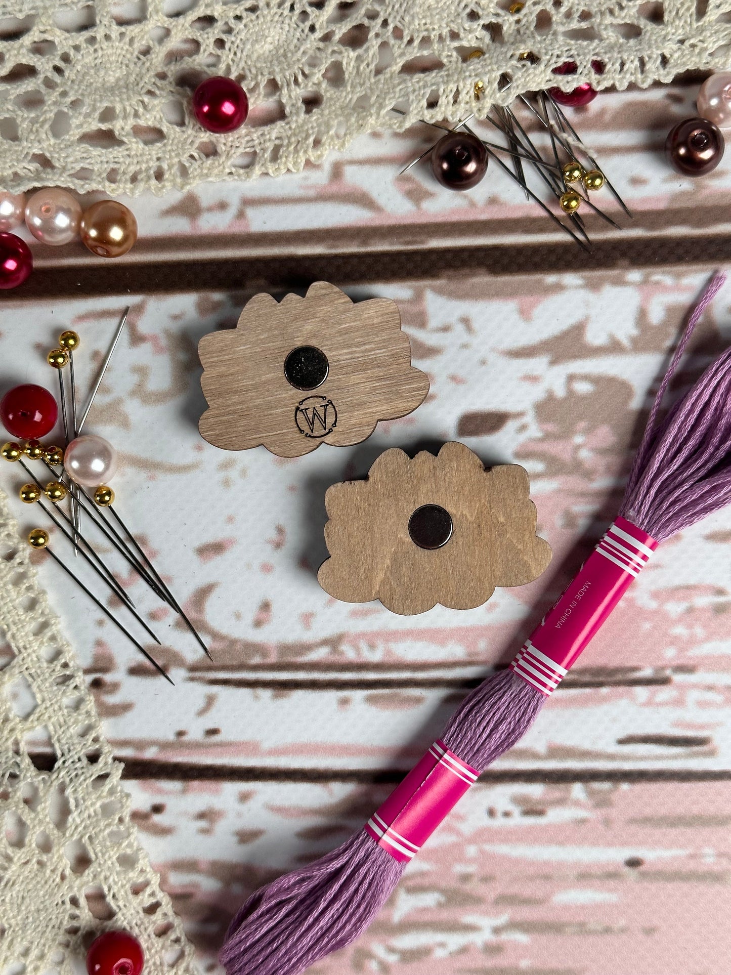 a close up of a piece of wood with a tassel