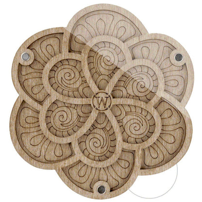 a set of four wooden coasters with a circular design