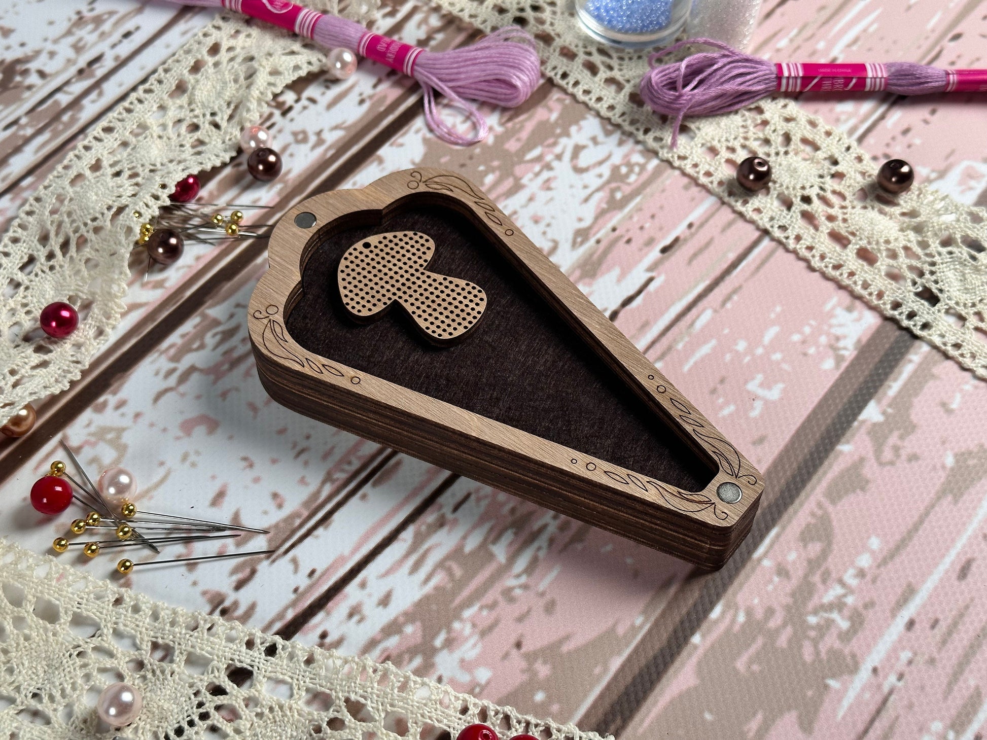 a wooden box with a heart cut out of it