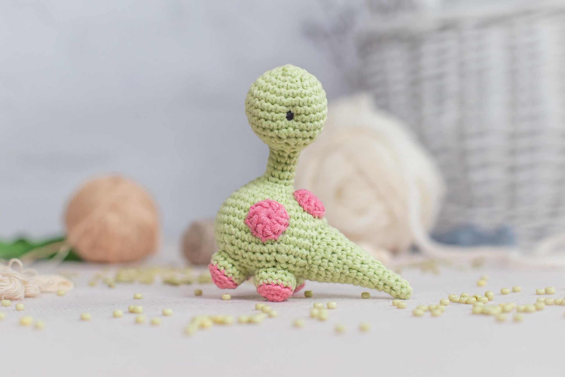 a crocheted toy sitting on top of a table