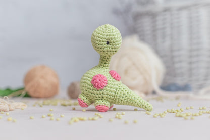 a crocheted toy sitting on top of a table