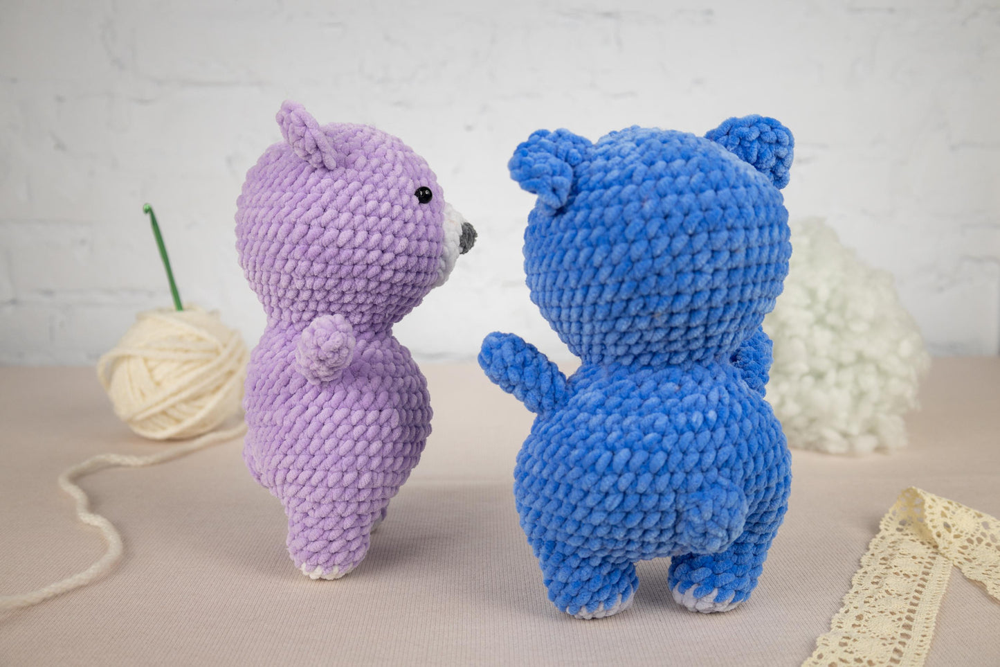 a couple of stuffed animals sitting next to each other