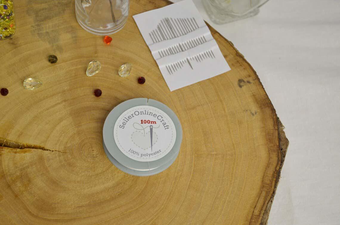 a clock sitting on top of a wooden table