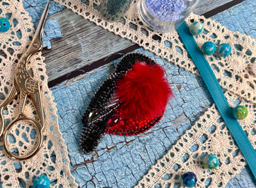 a pair of scissors sitting on top of a table