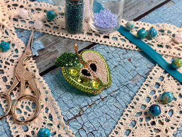 a pair of scissors sitting on top of a table