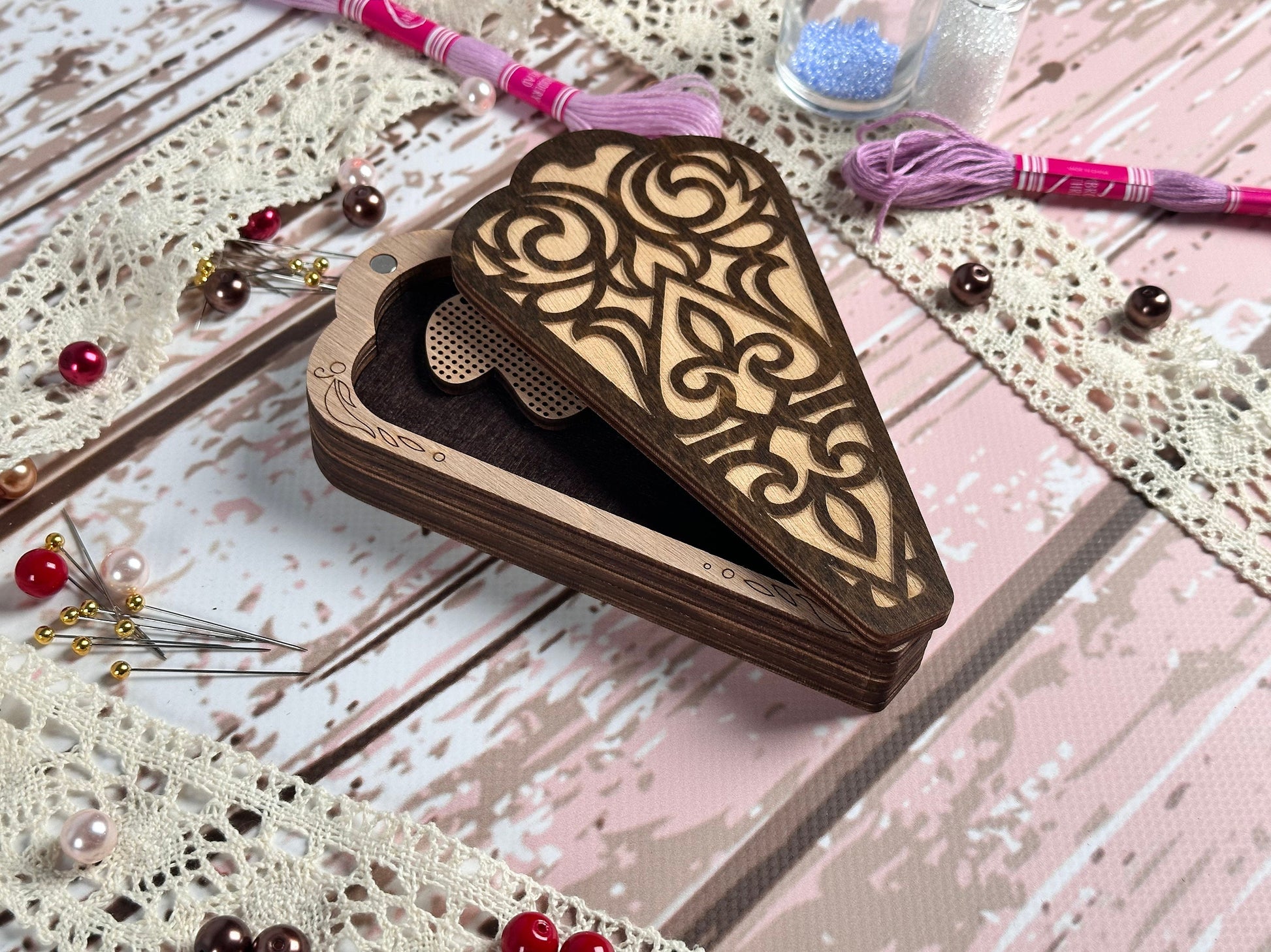 a wooden box with a design on it