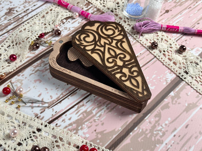 a wooden box with a design on it