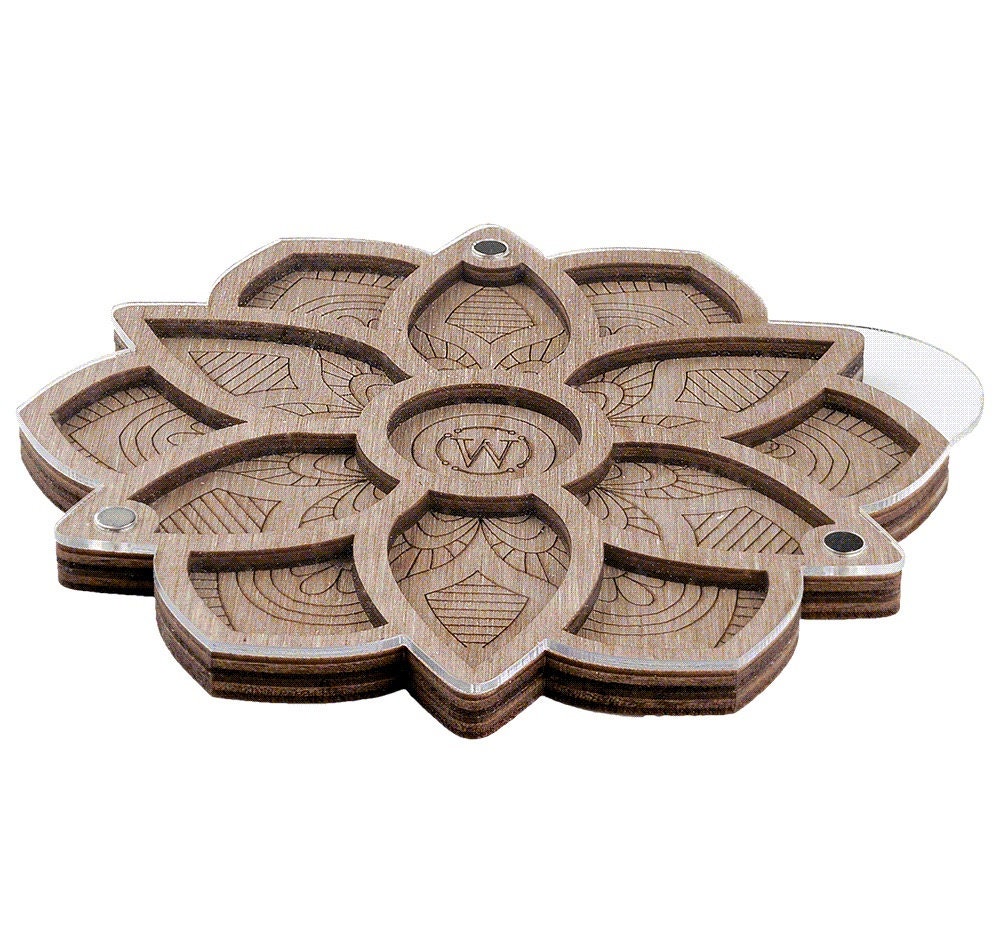 a set of four wooden coasters sitting on top of each other