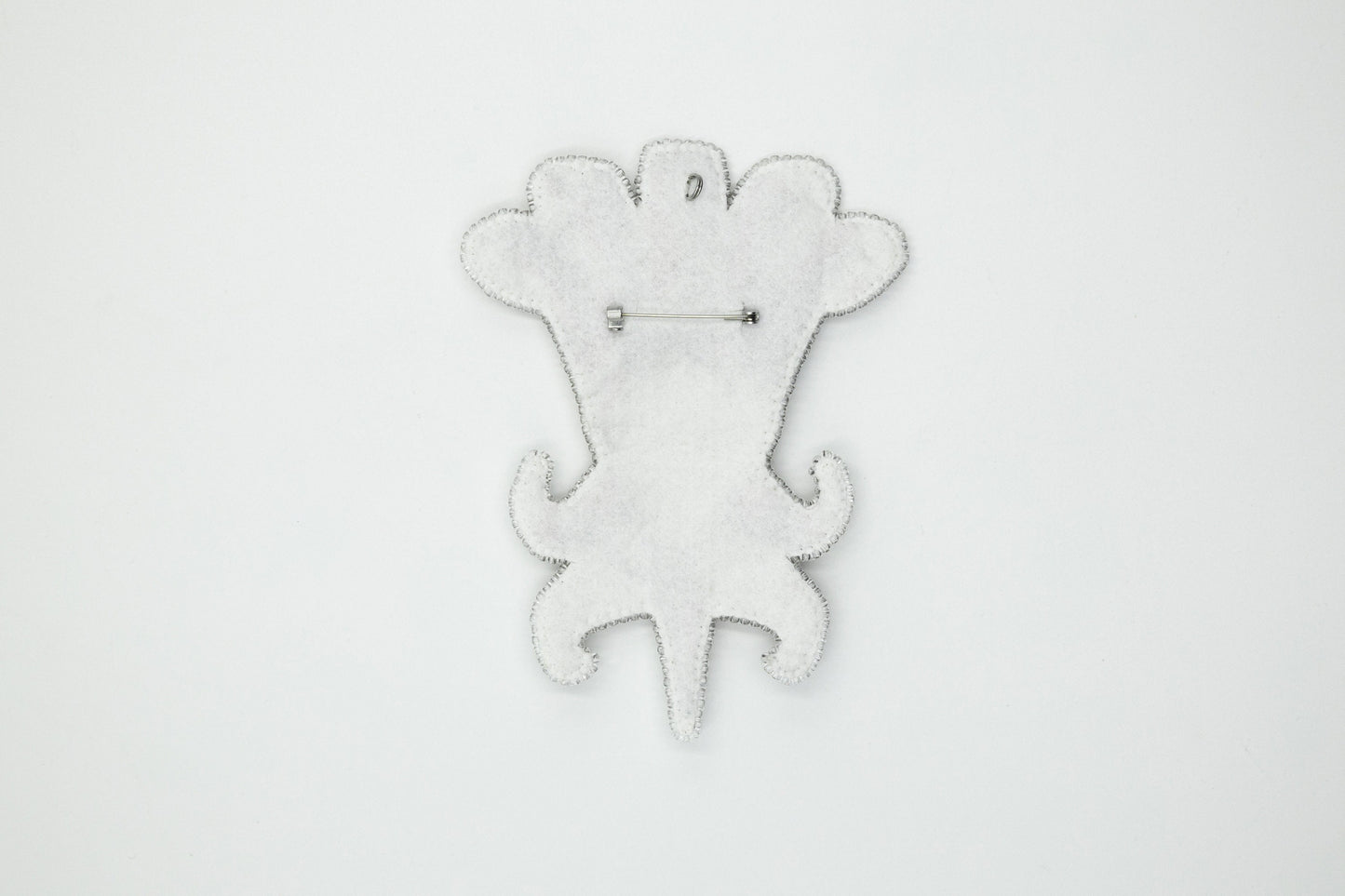 a white clock with a monkey design on it