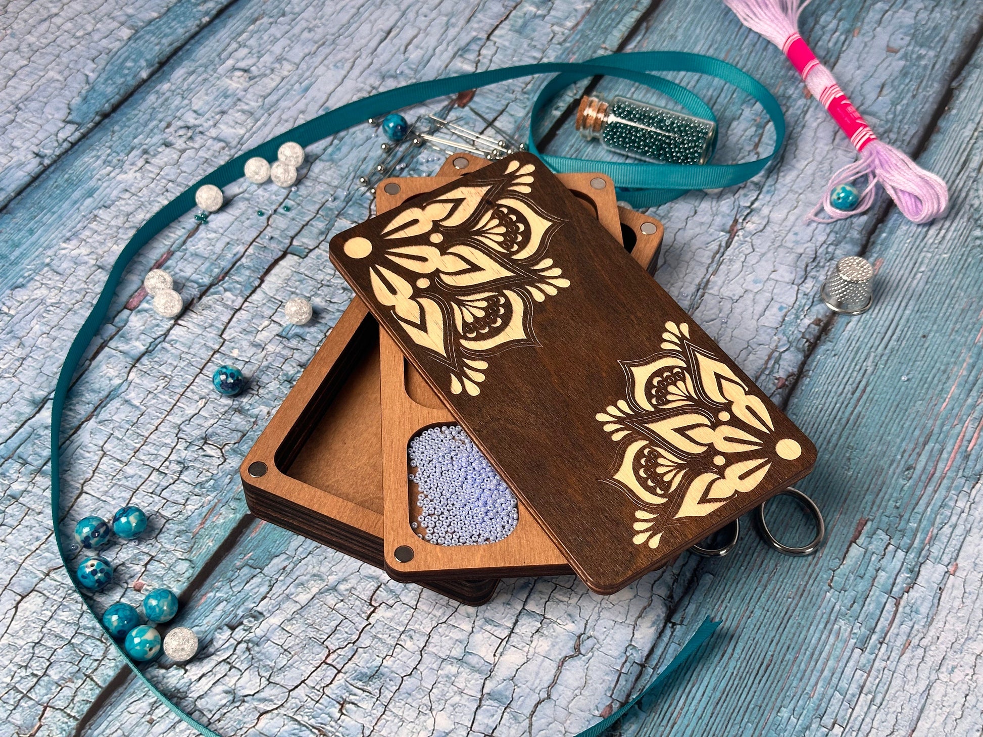 a wooden box sitting on top of a wooden table
