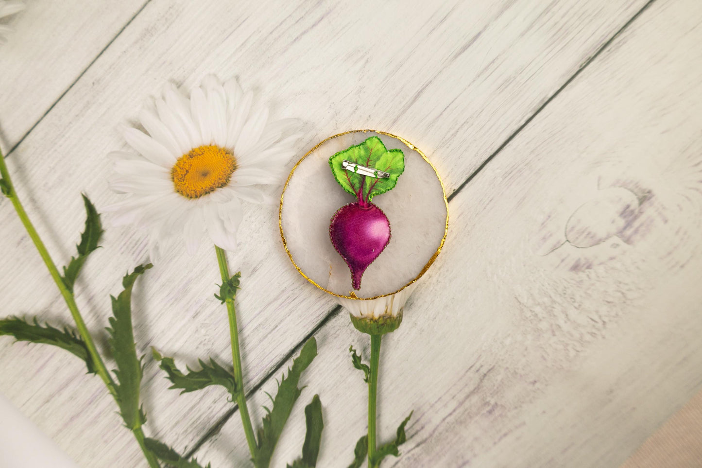 a plate with a radish and a flower on it