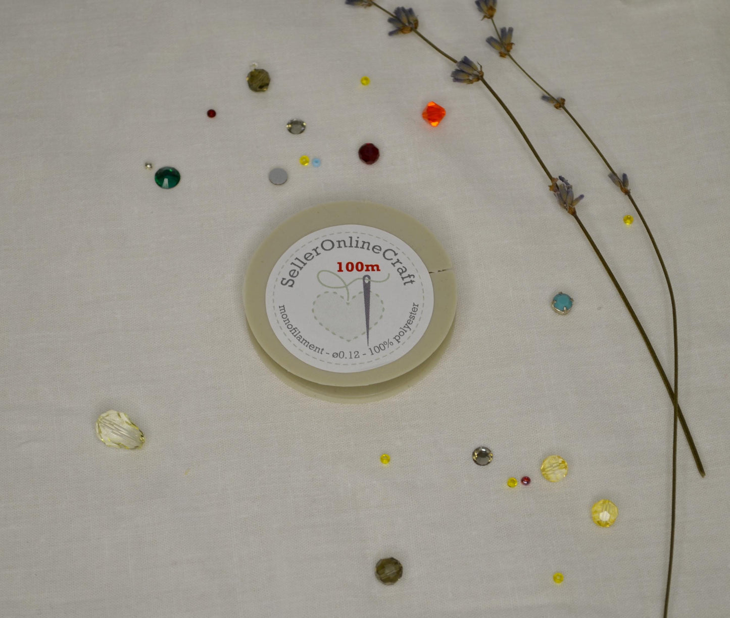 a white clock sitting on top of a table covered in confetti