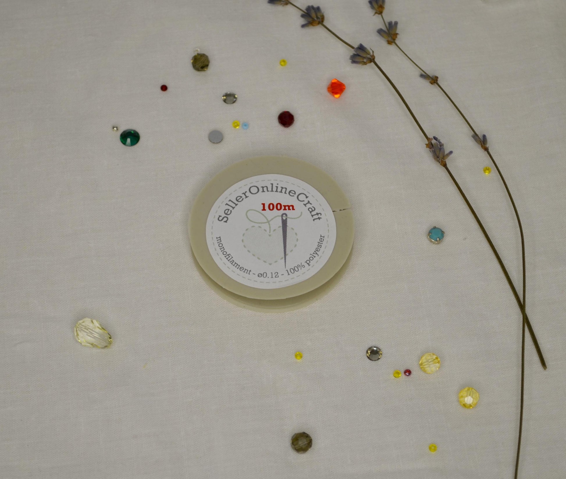 a white clock sitting on top of a table covered in confetti
