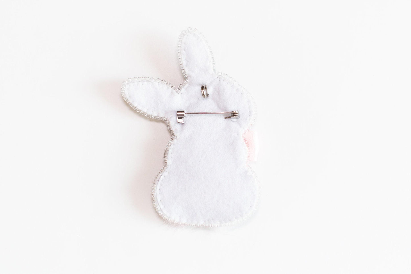 a white rabbit shaped object on a white surface