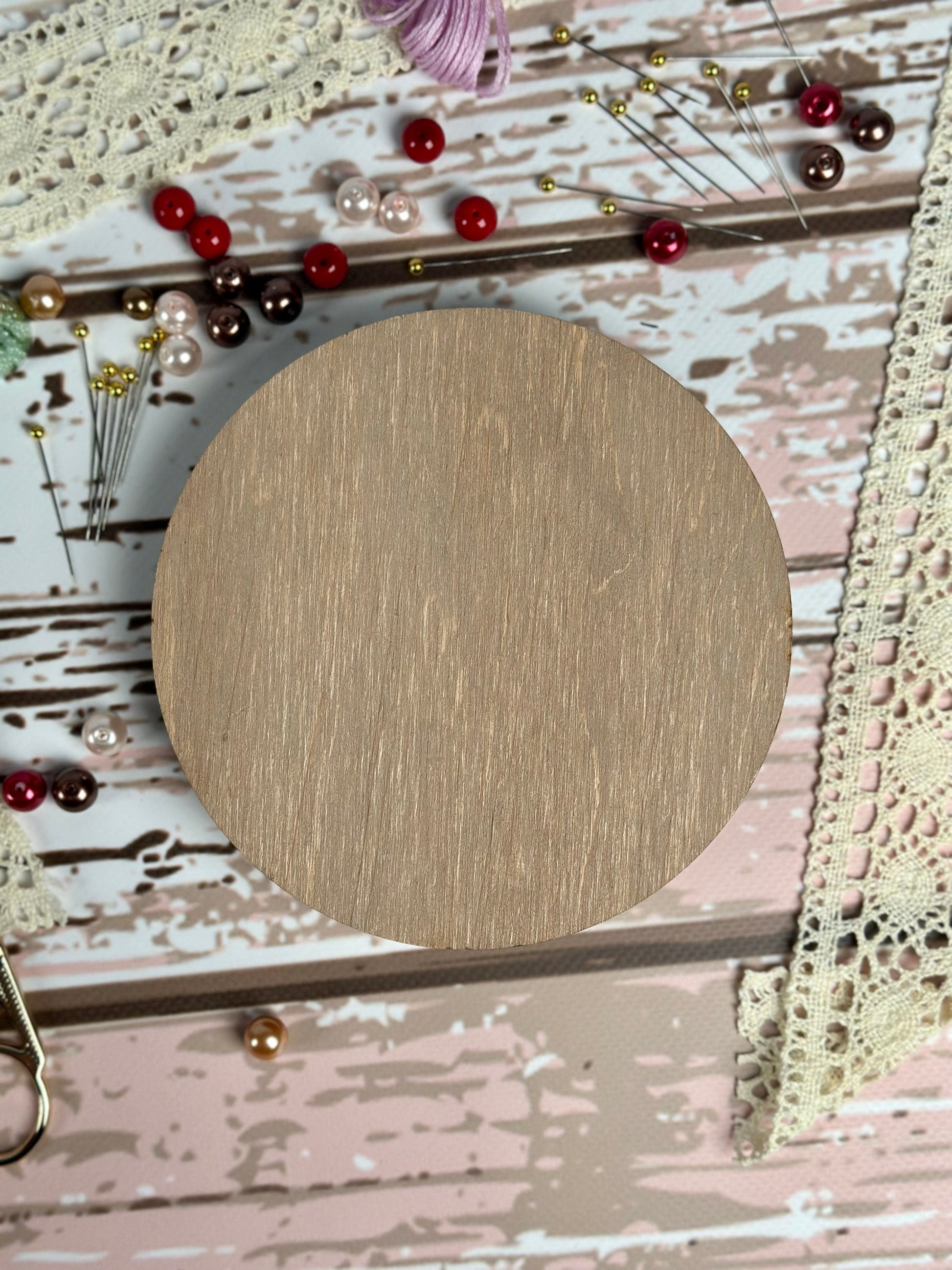 a wooden circle sitting on top of a table
