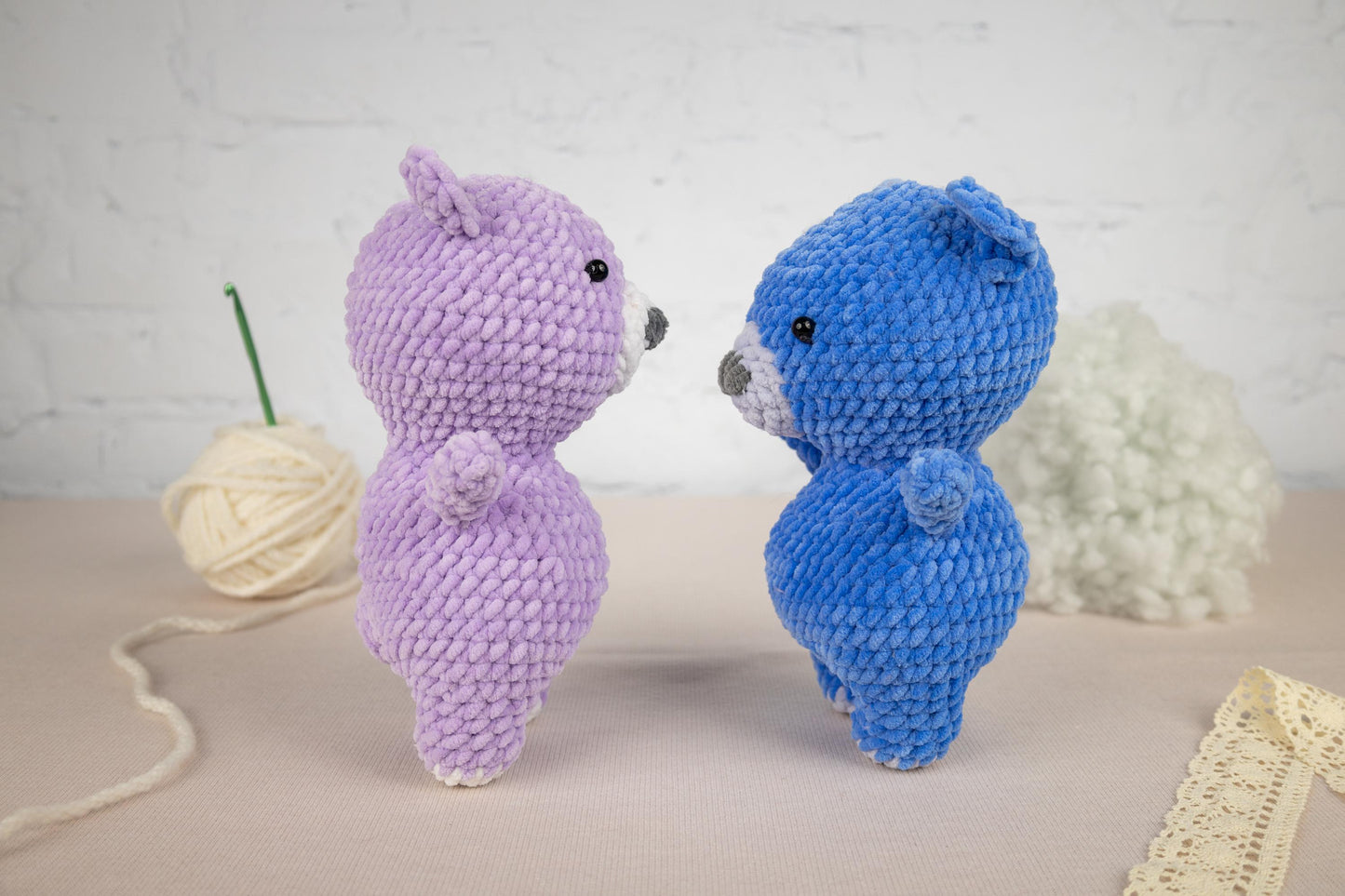 a couple of stuffed animals sitting next to each other