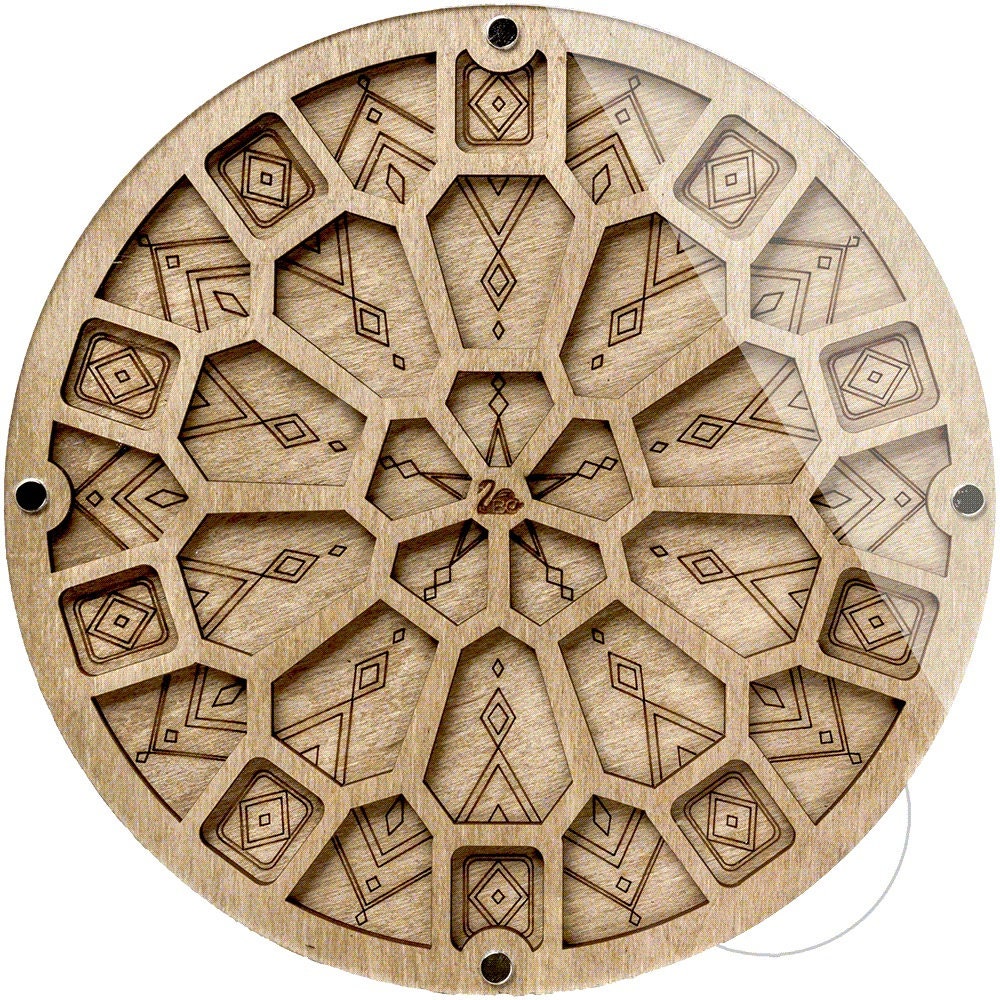 a wooden clock with geometric designs on it