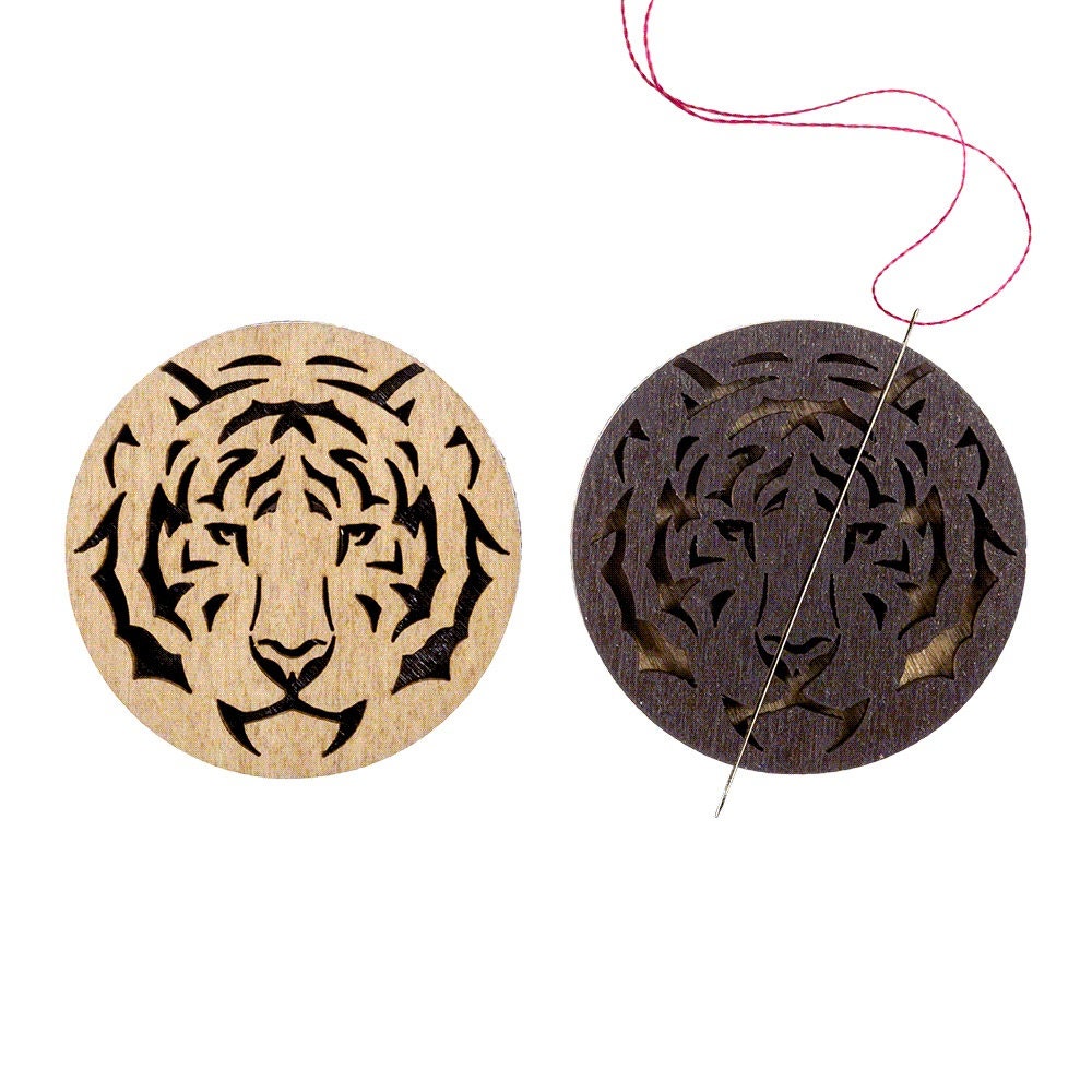 two wooden coasters with designs of a tiger and a tiger