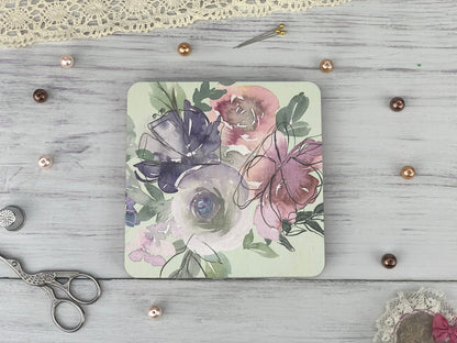 a picture of some flowers and a pair of scissors