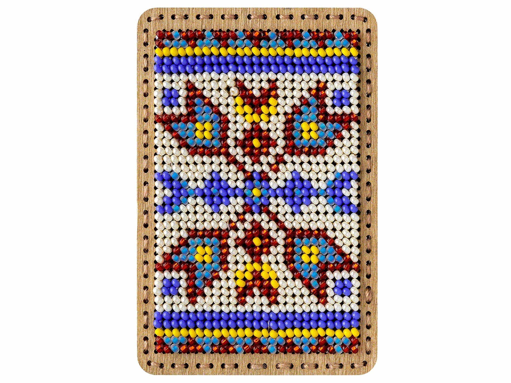 a beaded picture of a cross on a white background