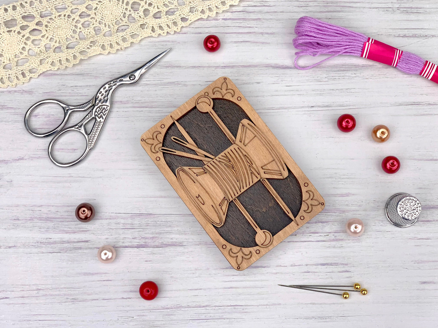 a wooden box with a picture of a man on it next to a pair of
