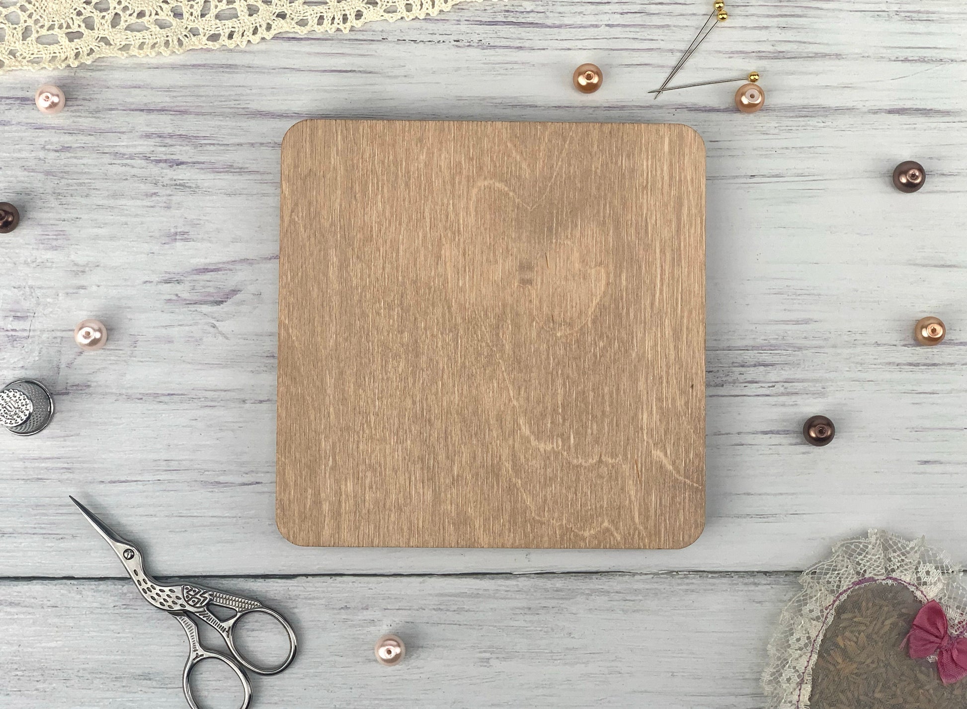 a wooden cutting board sitting on top of a table