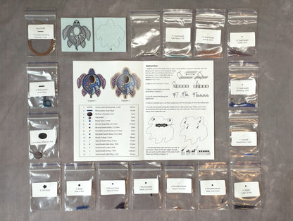 various packages and instructions for crafting jewelry, including beads, chains, and other materials.