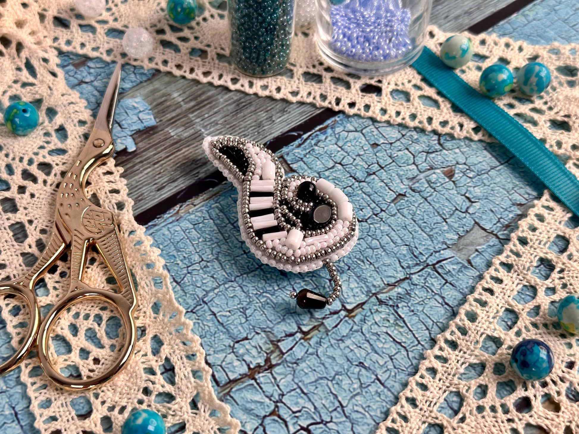 a pair of scissors sitting on top of a table