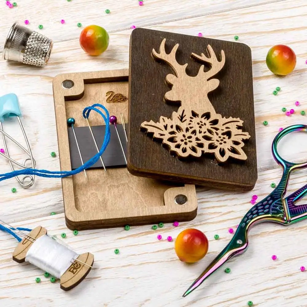 a wooden cutting board with a deer head on it