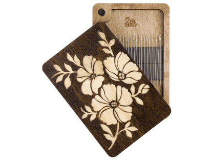 a piece of wood with a flower design on it