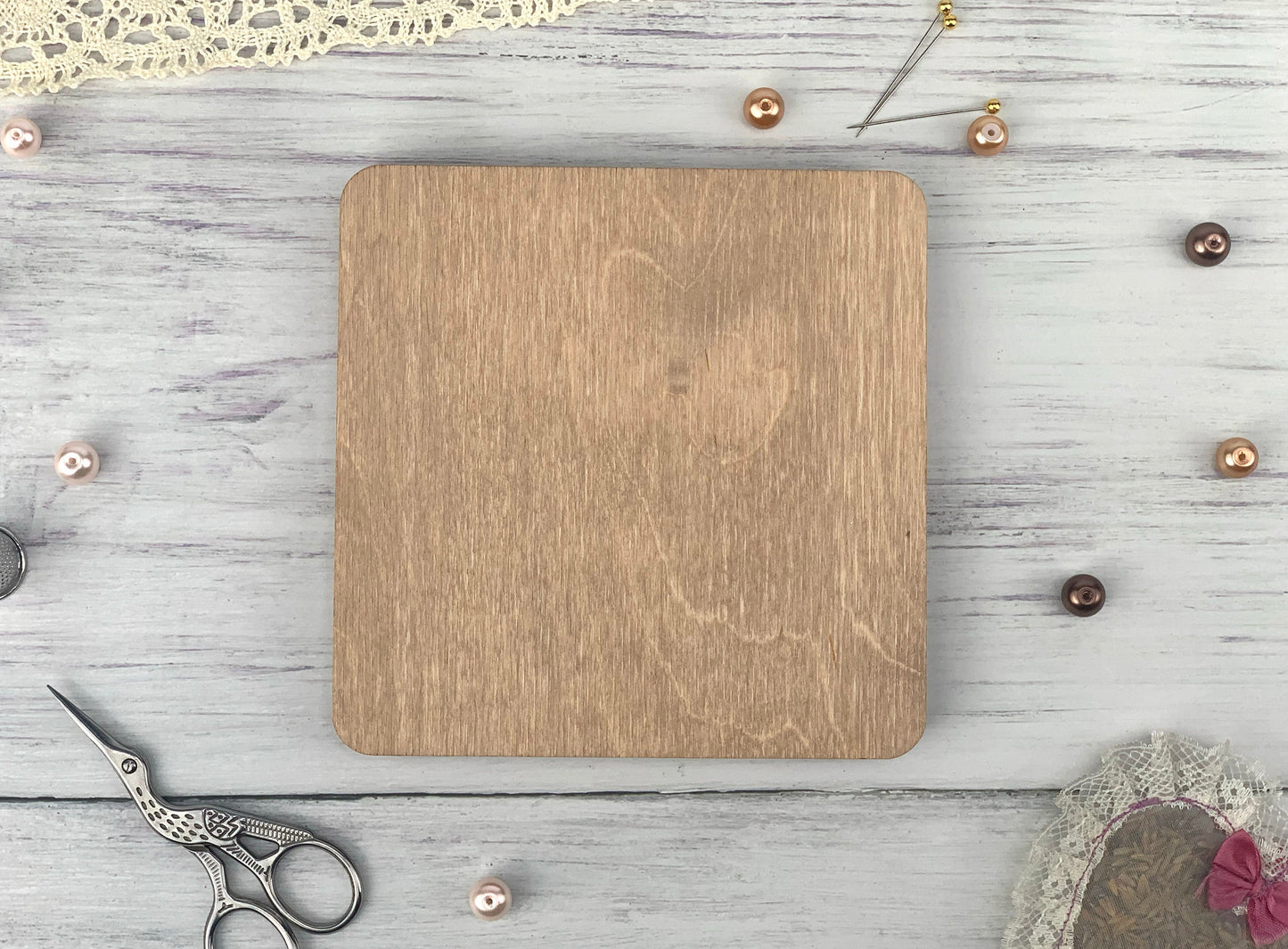 a wooden cutting board sitting on top of a table