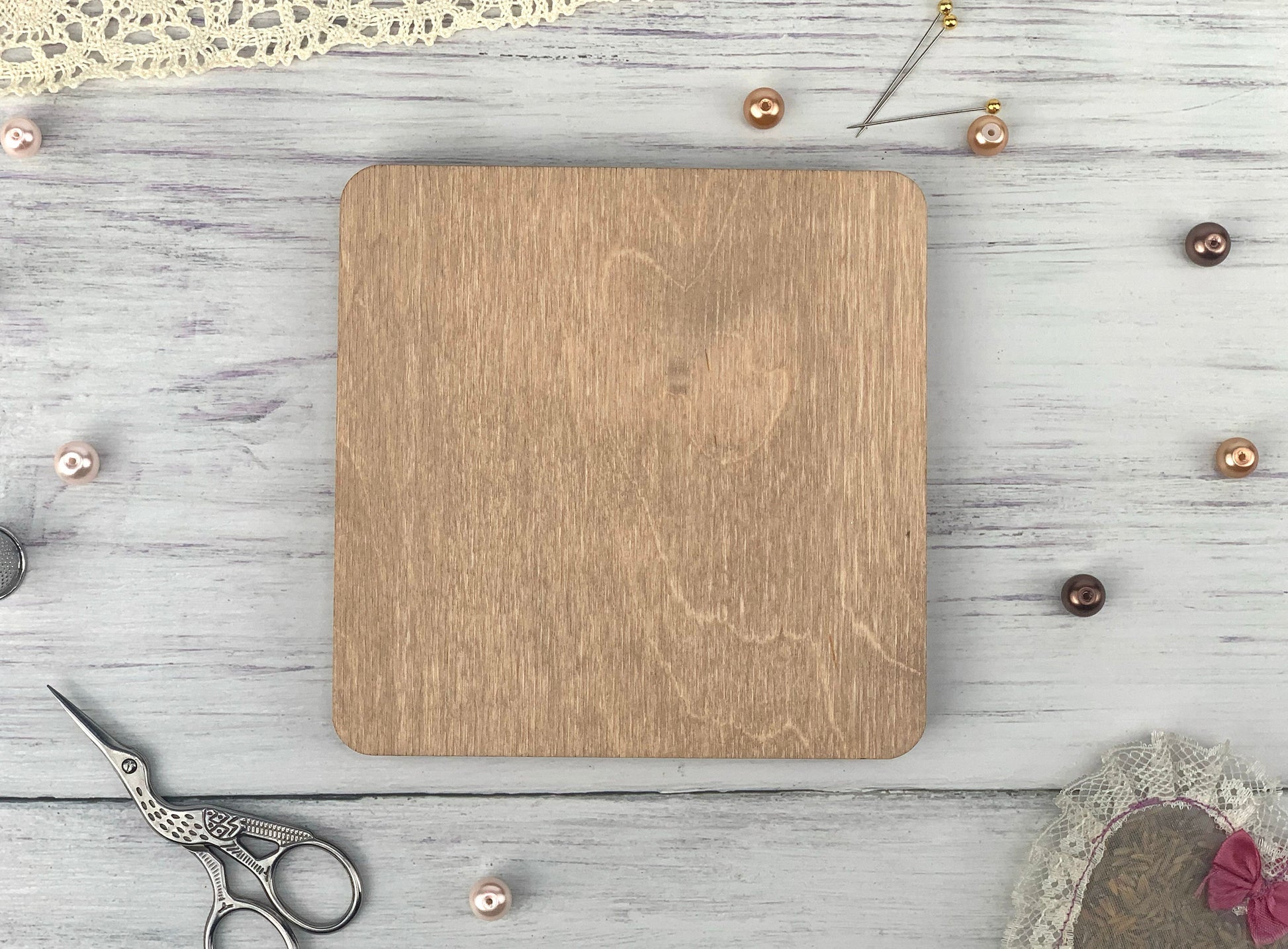 a wooden cutting board sitting on top of a table