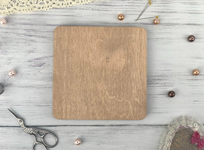 a wooden cutting board sitting on top of a table