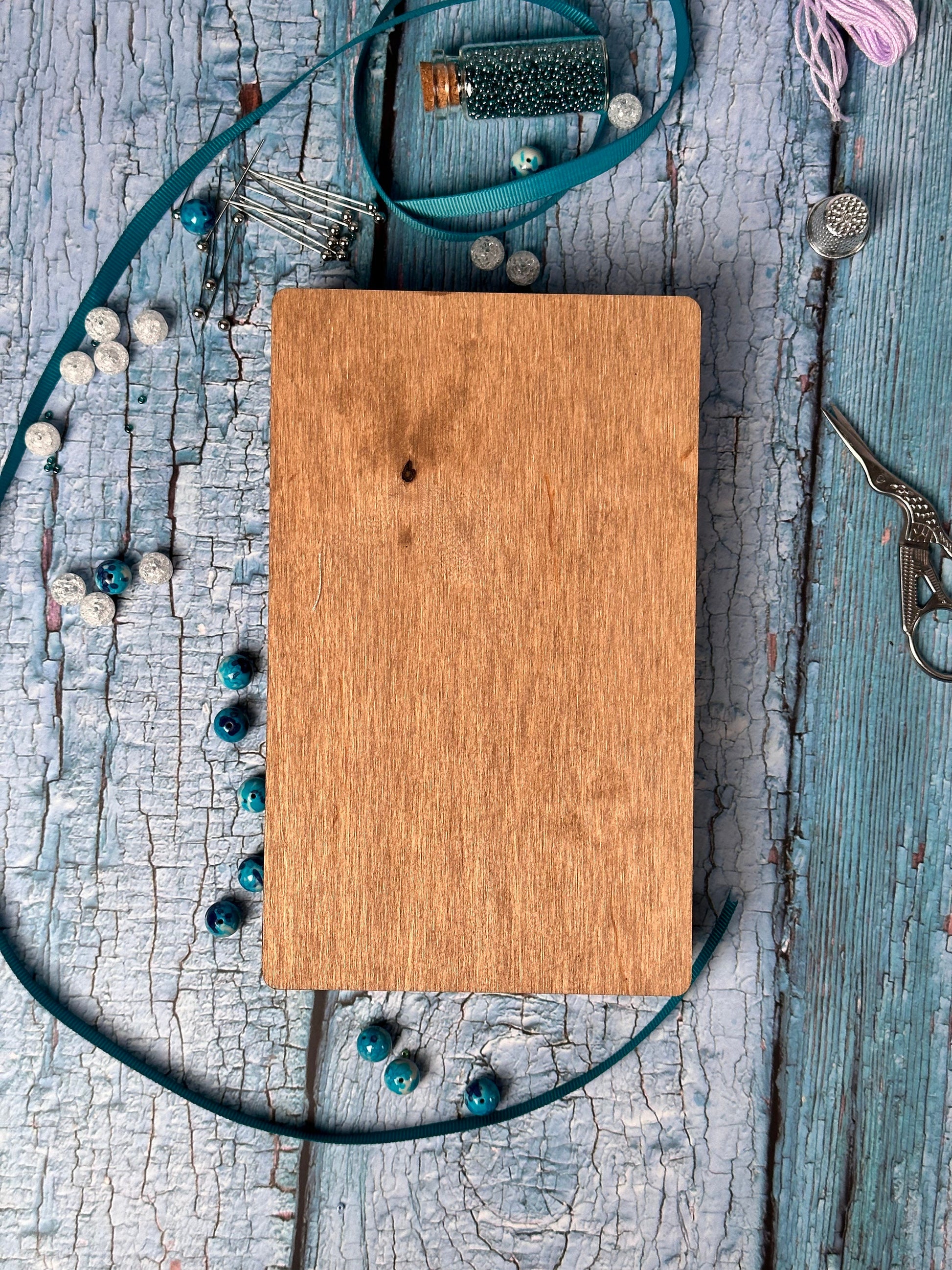 a wooden cutting board sitting on top of a table