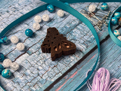 a close up of a butterfly on a piece of wood